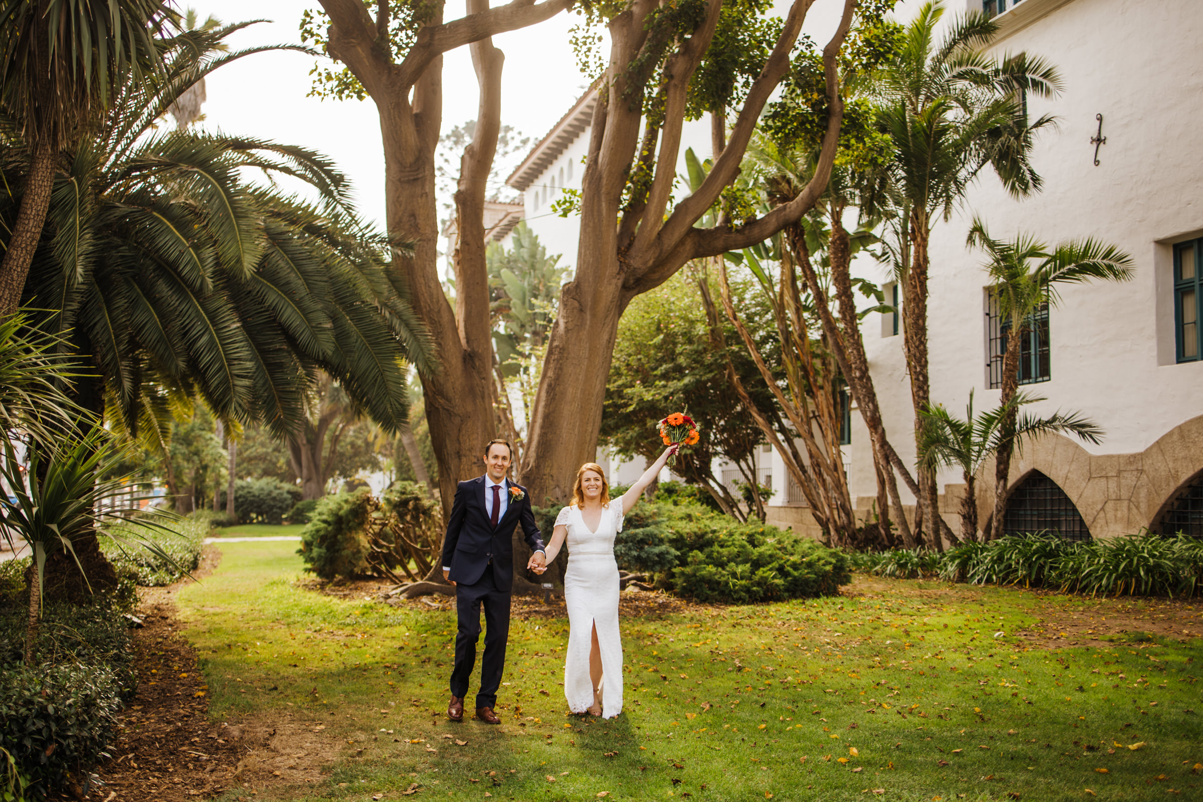 bride and groom couple photos on lawn at SB Courthouse