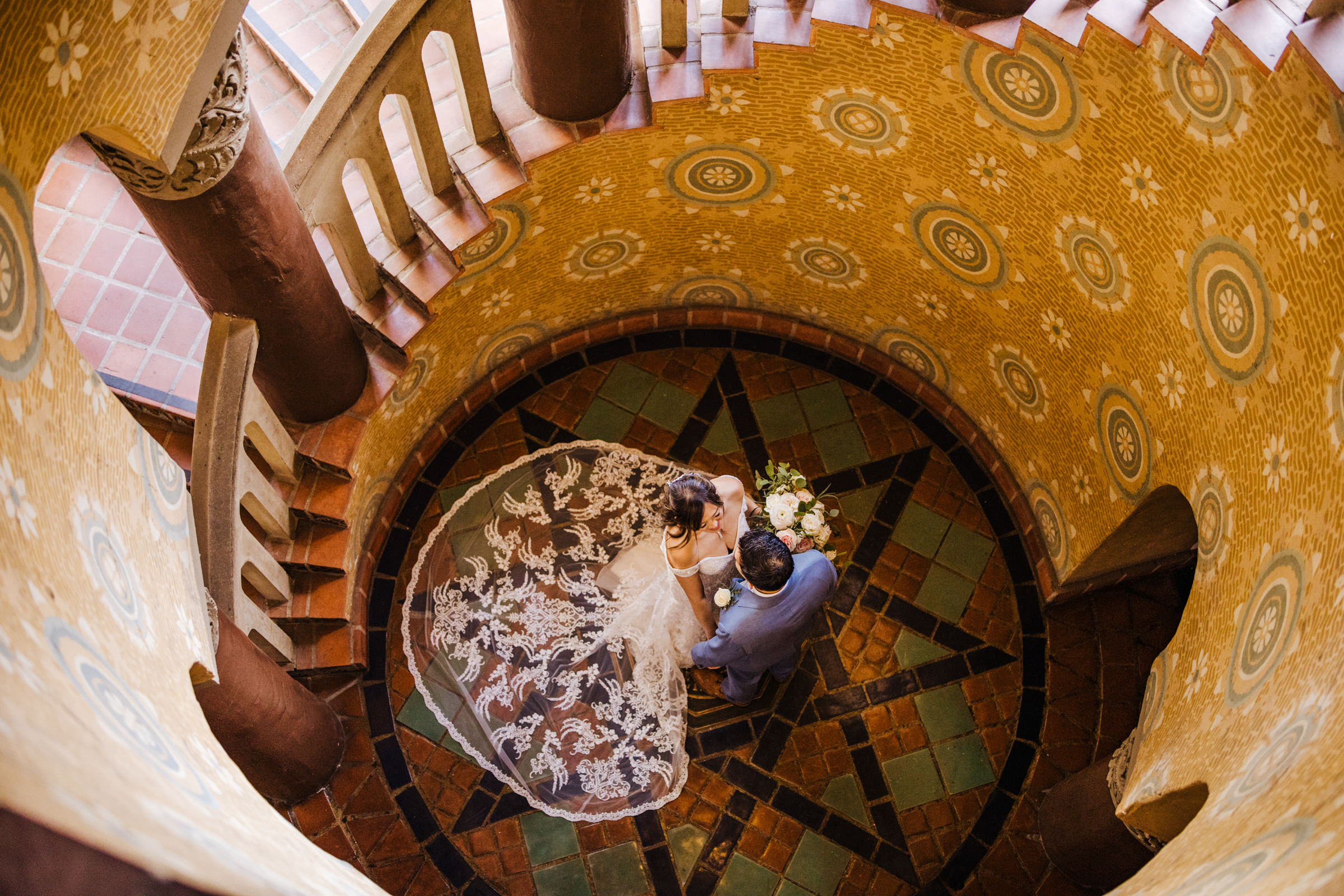 view from above bride and groom in SB Courthouse tower