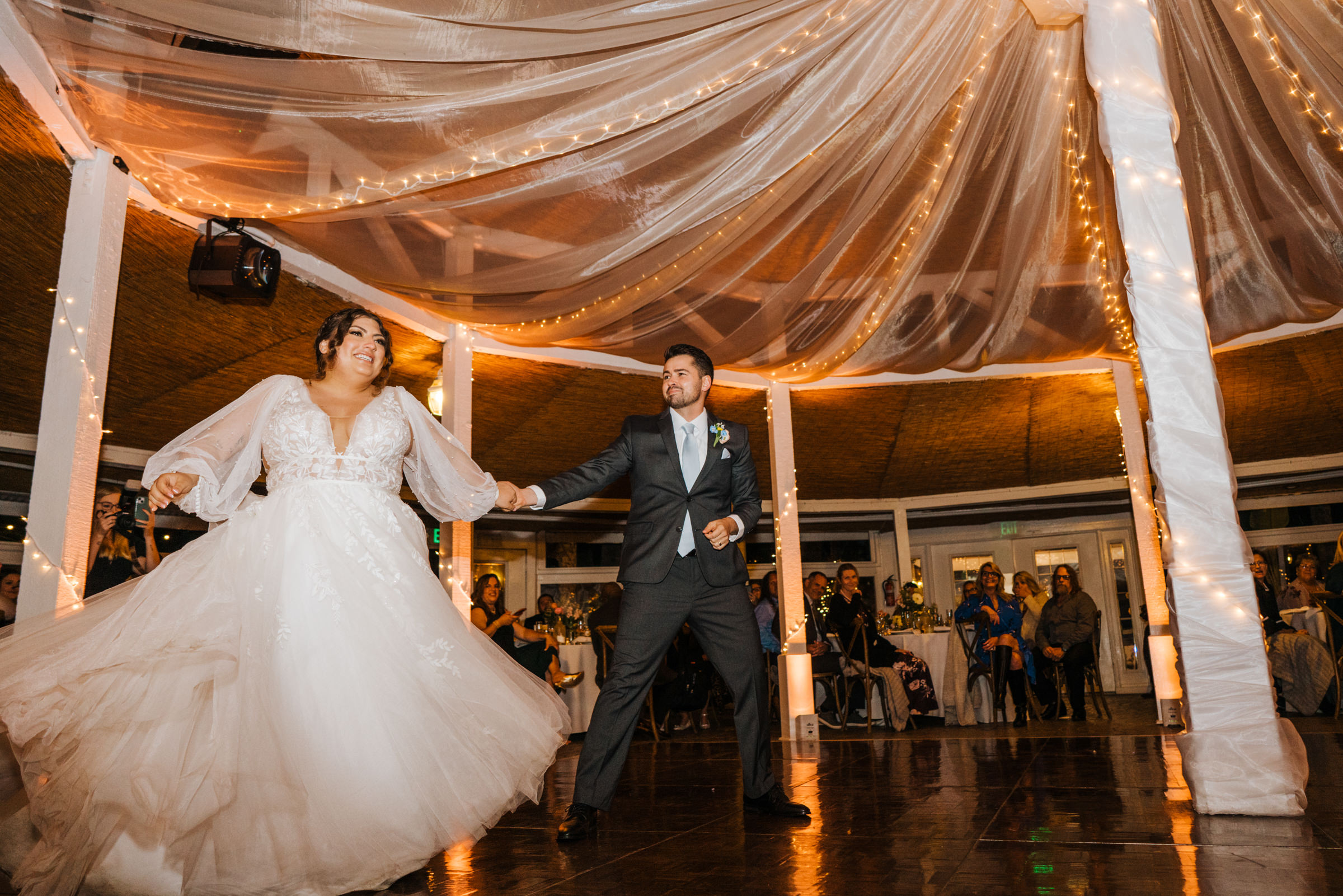 Bride and groom dancing at their reception at Rancho de las Palmas in Moorpark, CA