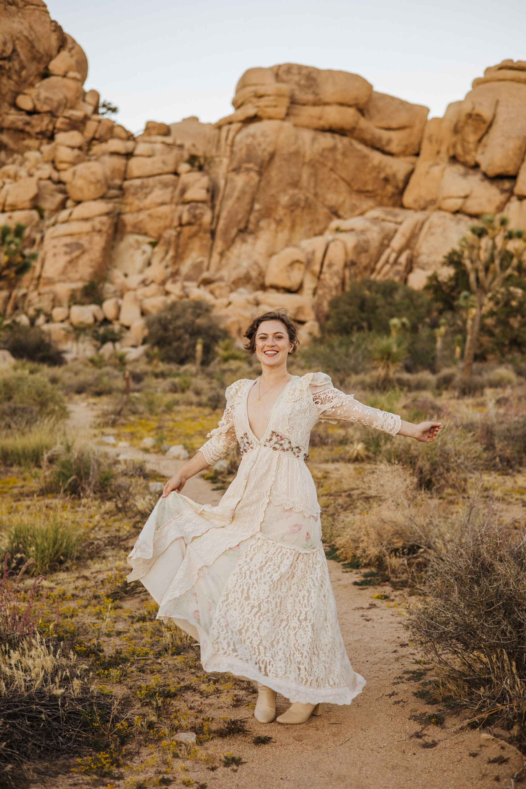 Bride twirling in Joshua Tree wedding dress