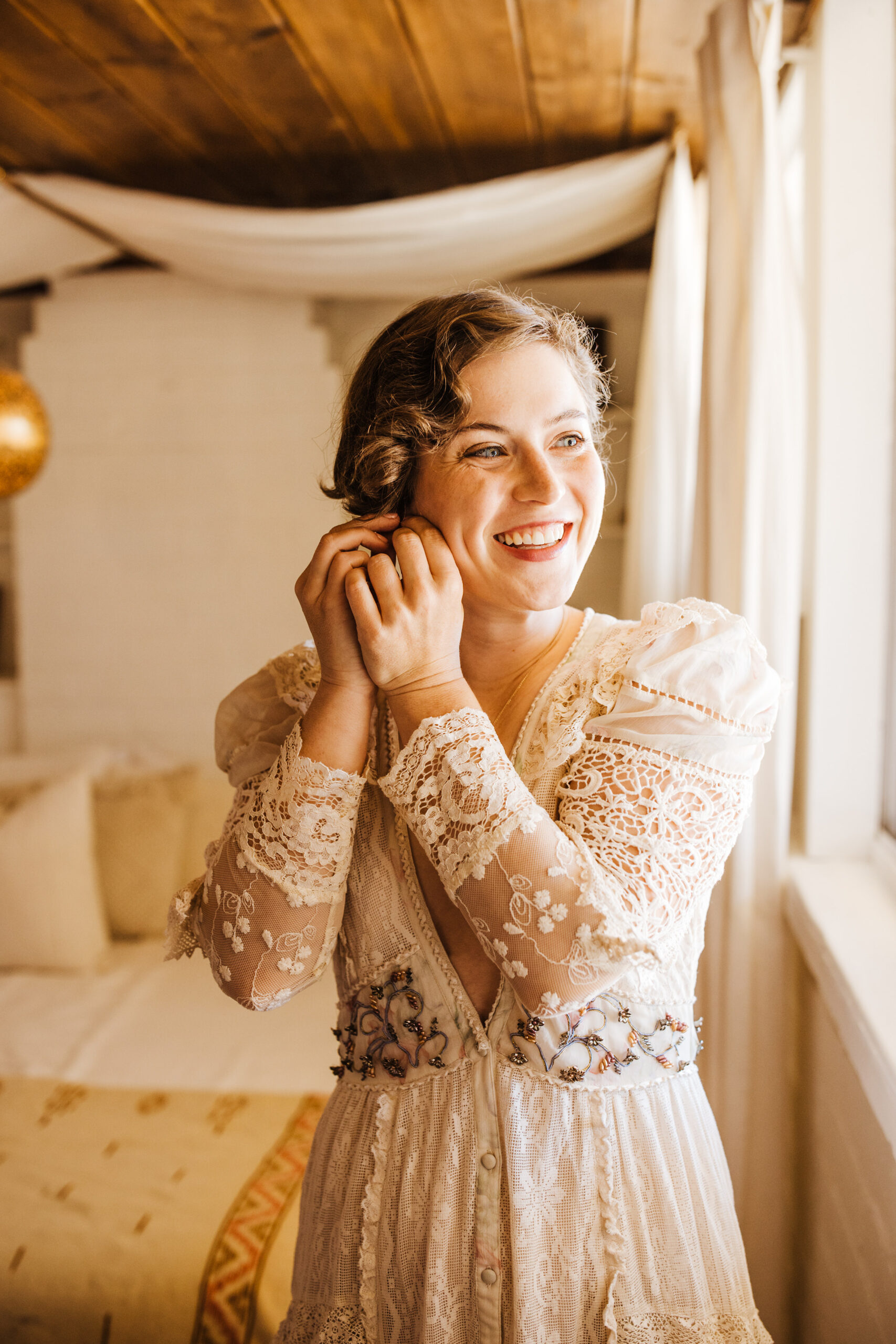 Bride smiling in Joshua Tree AirBnb